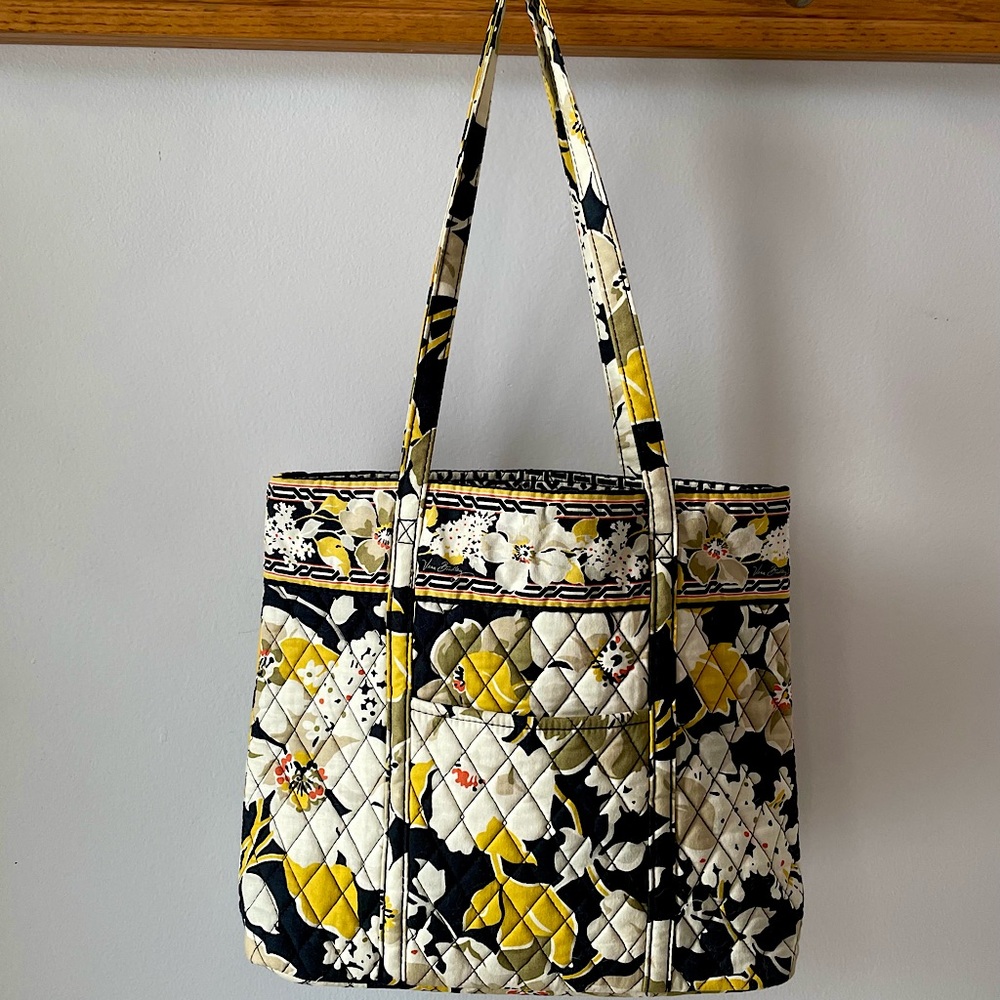 Vera Bradley tote in Dogwood
Retired pattern yellow, tan, black outside